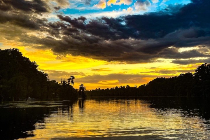 a sunset over a body of water