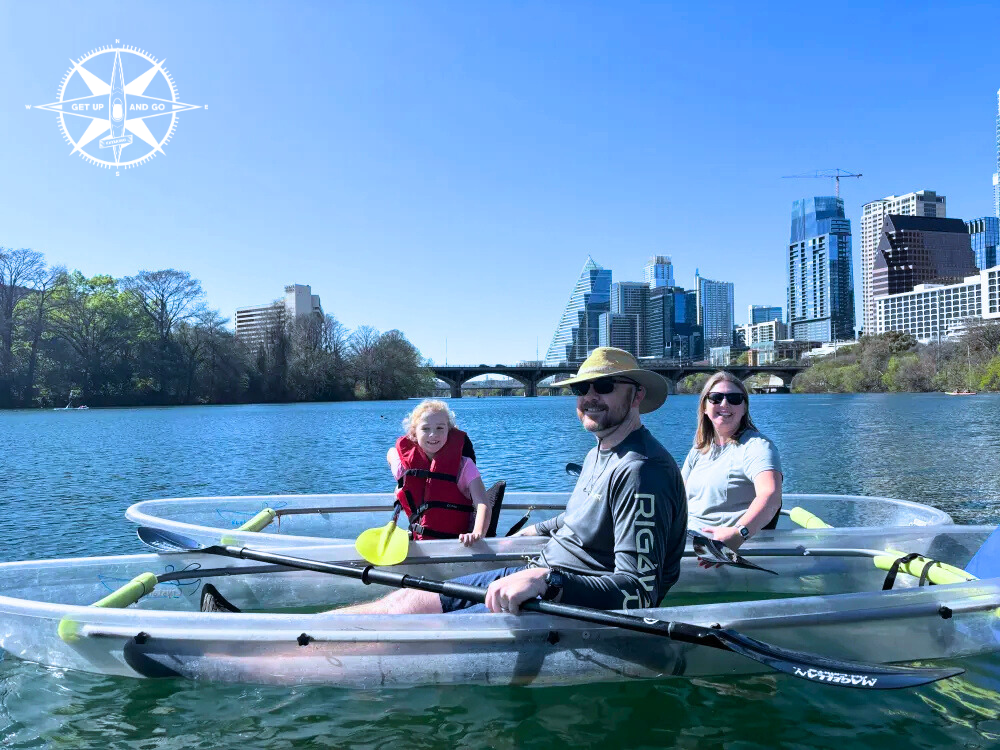 a group of people rowing a boat in the water