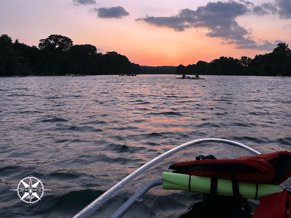 a boat sitting next to a body of water
