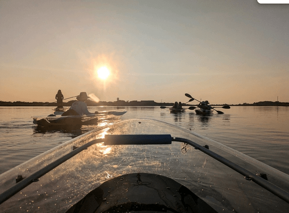 a boat is docked next to a body of water