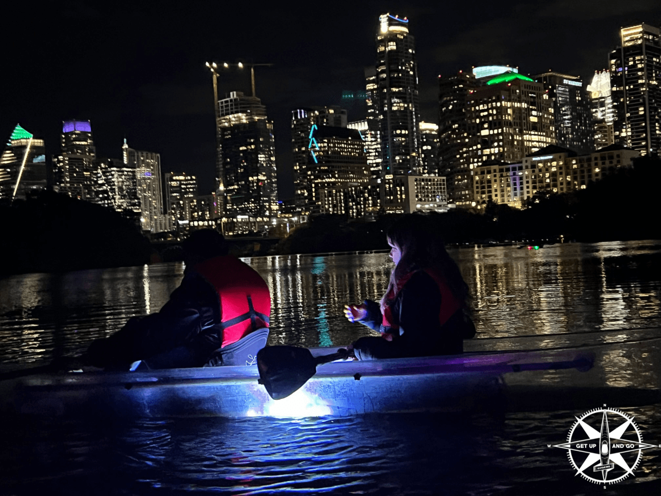a couple of people that are floating in the water