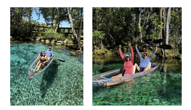 Two people in clear kayaks on crystal-clear water surrounded by trees.